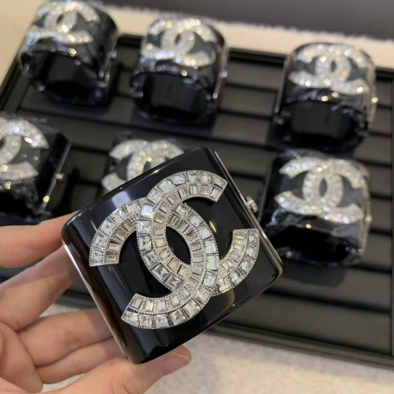 Elegant Chanel Black Cuff Bracelet with Crystal Detailing