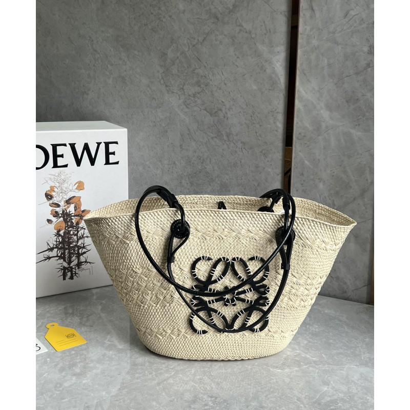 Medium Anagram Basket bag in iraca palm and calfskin