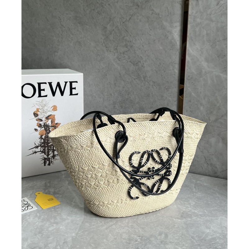 Medium Anagram Basket bag in iraca palm and calfskin