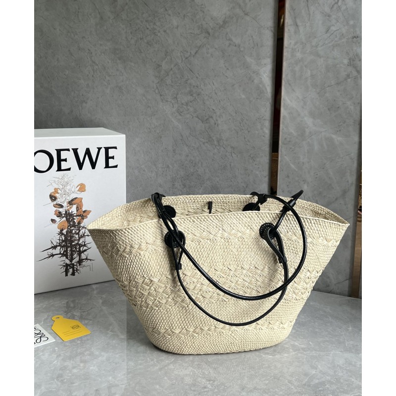 Medium Anagram Basket bag in iraca palm and calfskin